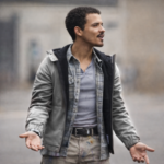 9-1-1 Nashville S01 Eddie Ramos jacket worn by character in TV series scene, stylish brown cotton jacket featured in action drama wardrobe collection 2026.